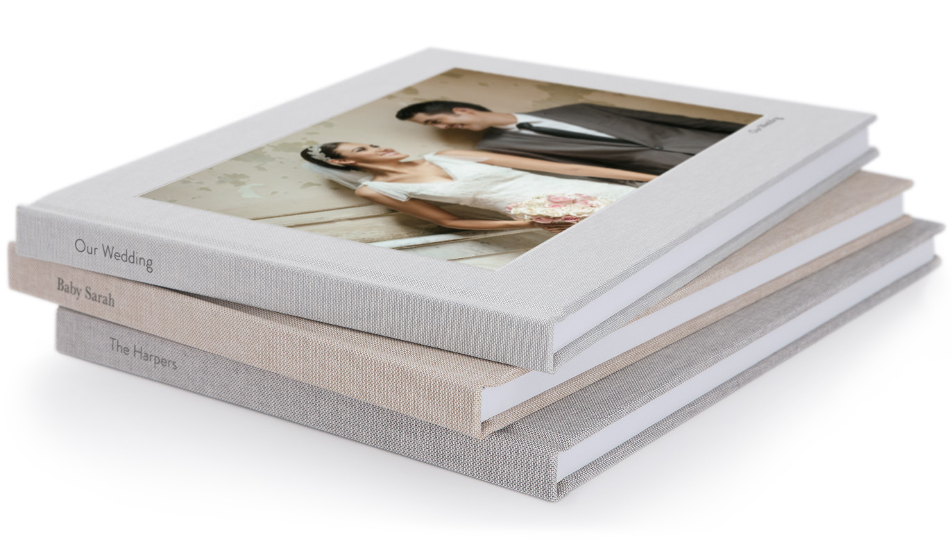 3 Premium Photo Books stacked atop each other