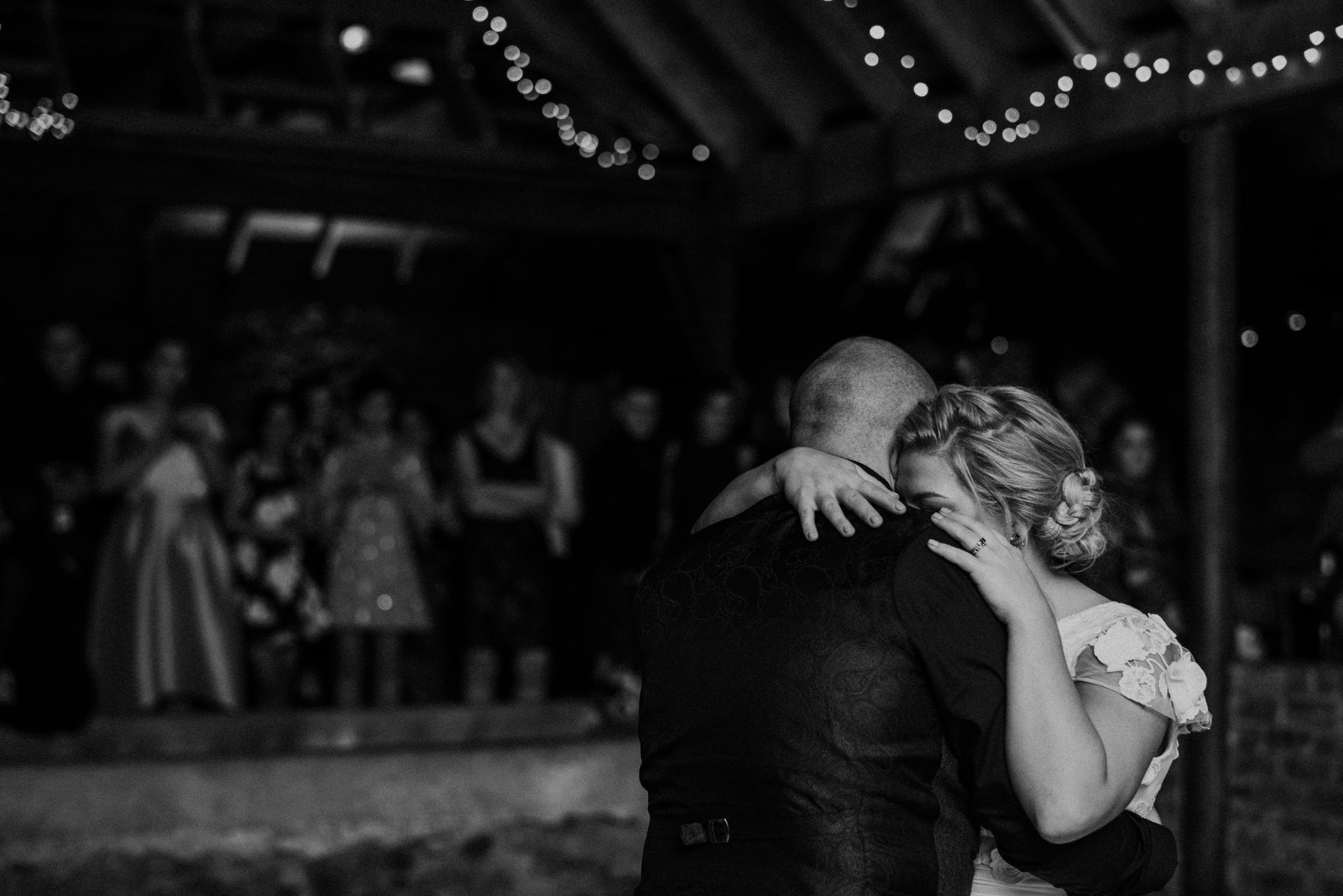 Newlyweds slow dance at reception
