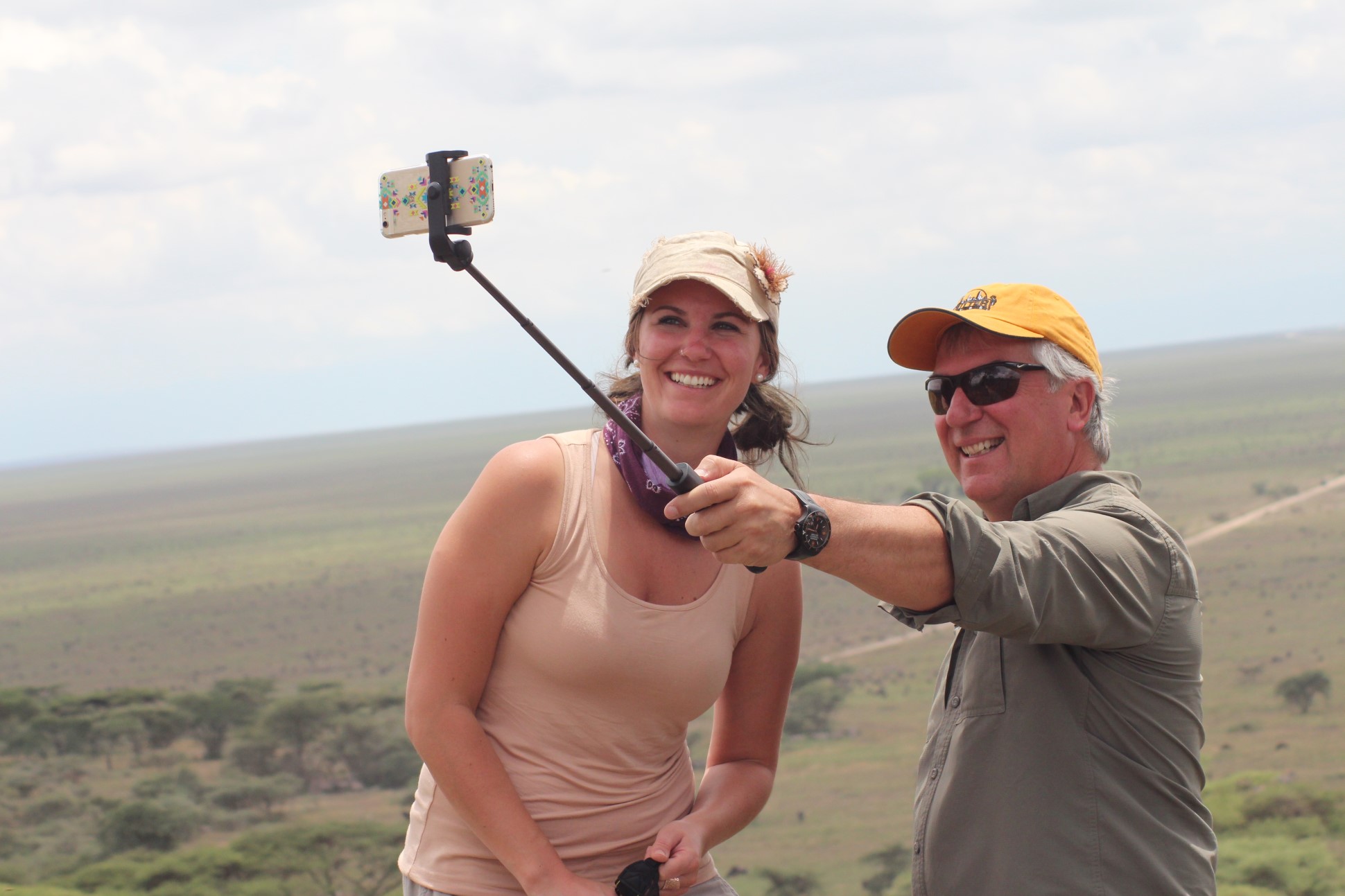 Father and daughter take selfie together