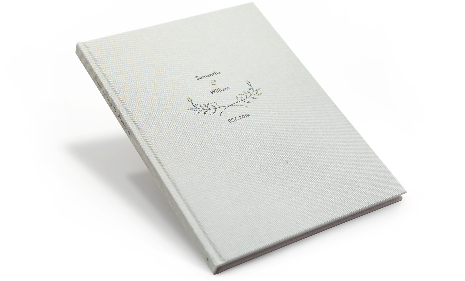 Álbum de fotos de boda premium de lino gris con una cubierta de diseño.