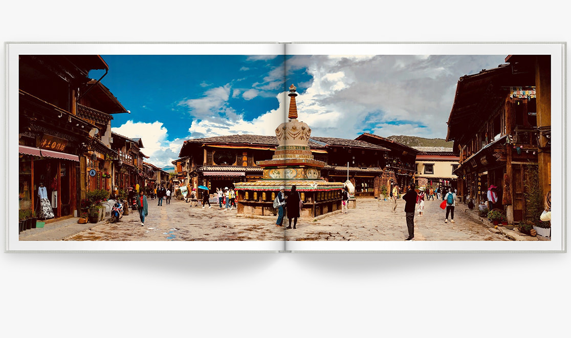 Open Photo Book showing travel photo taken in Tibet