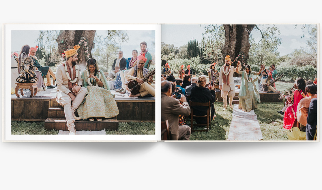 Open Photo Book showing photos of Indian wedding ceremony