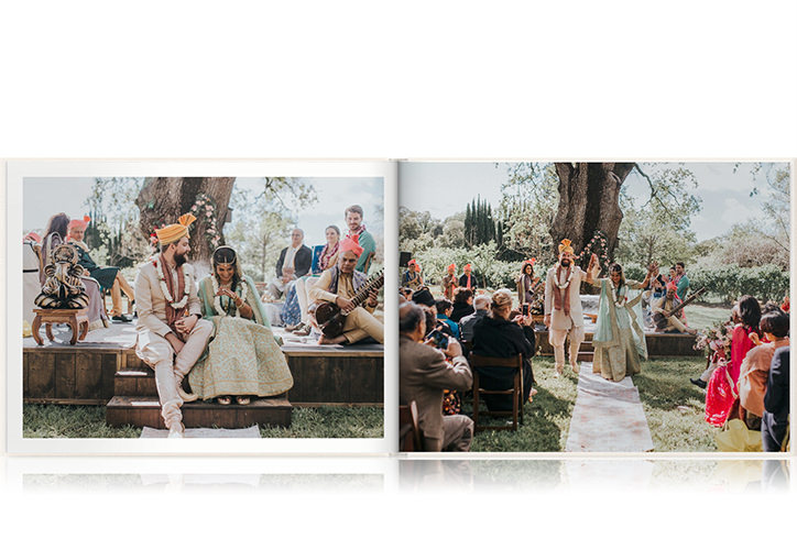 Open photo book with images of a couple on their wedding day.