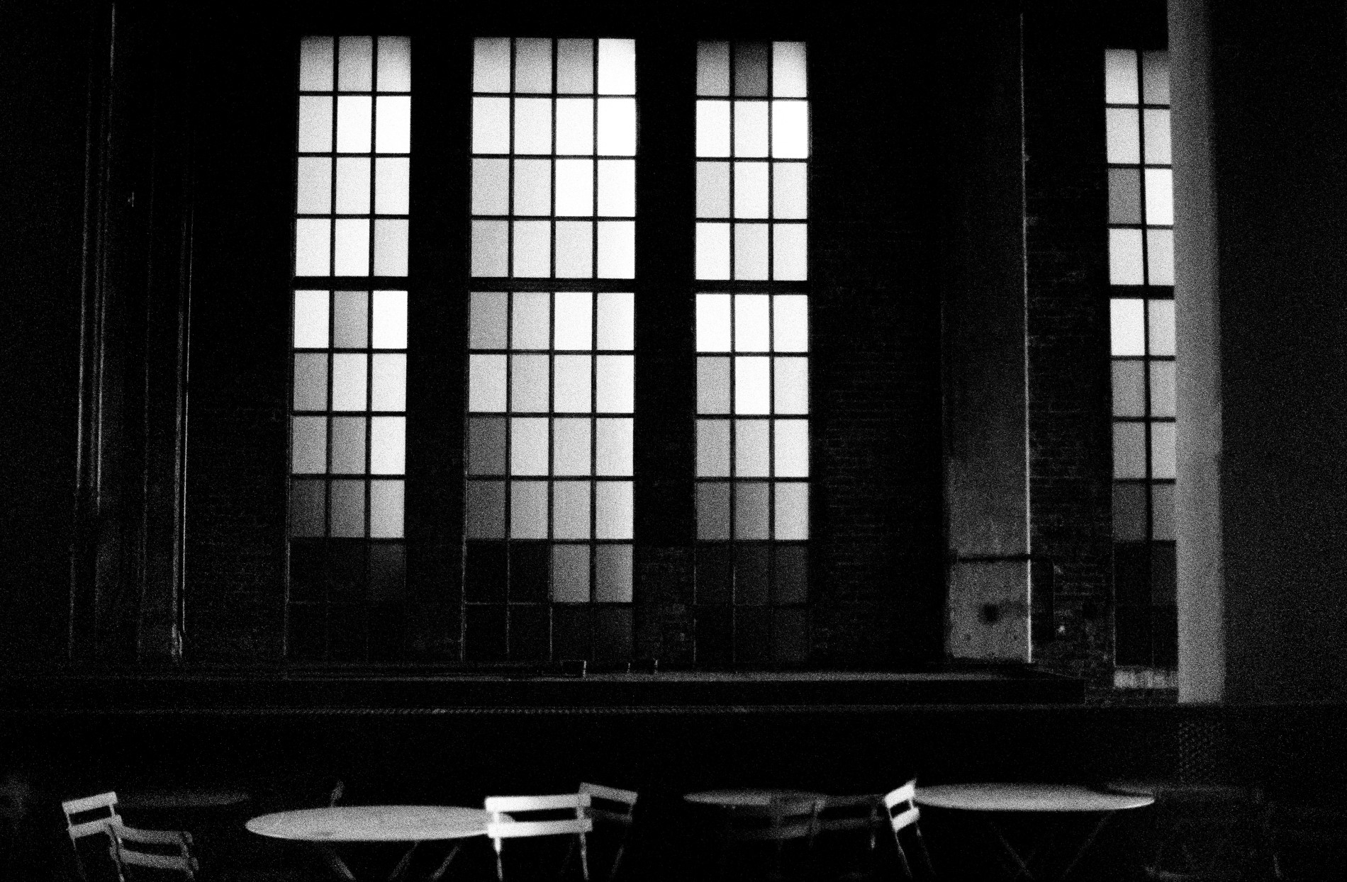 Empty tables and chairs in room