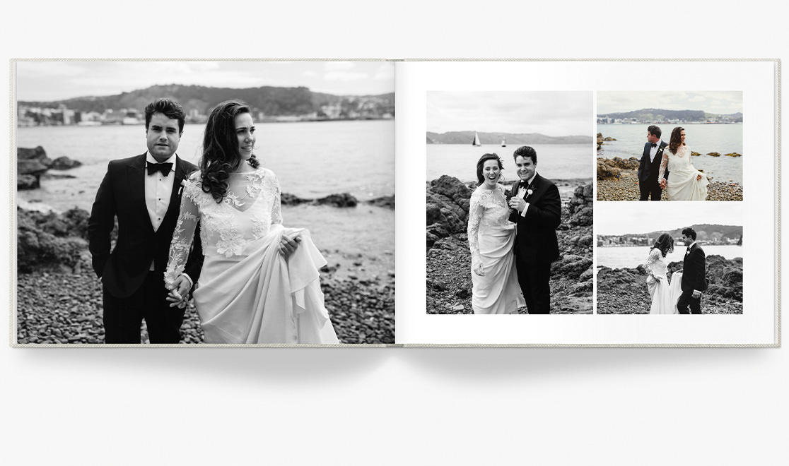 Open photo book with images of newlywed couple.