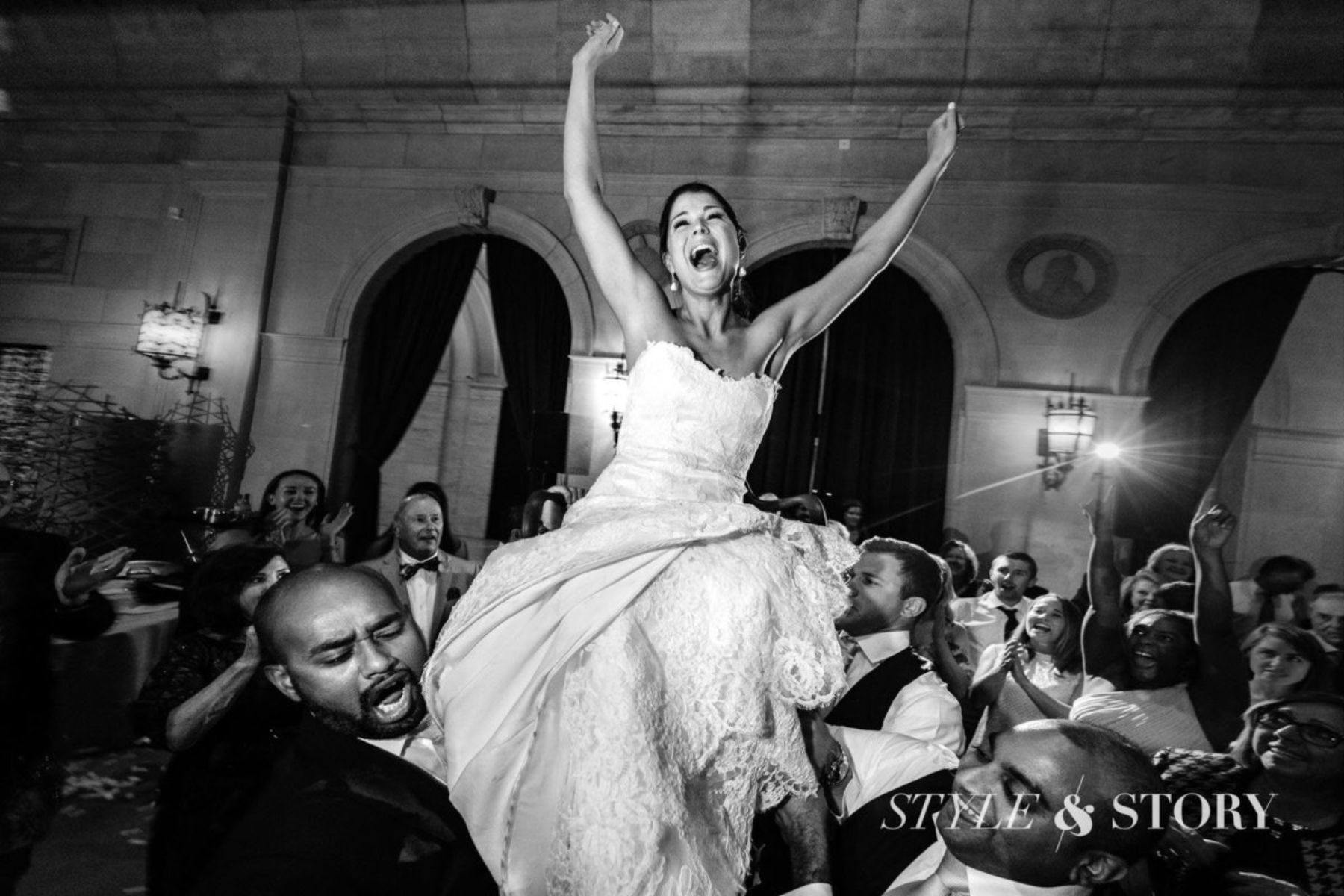 Overjoyed bride at wedding reception
