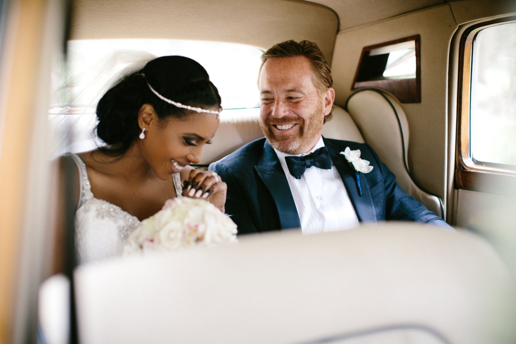 Bride and father in car