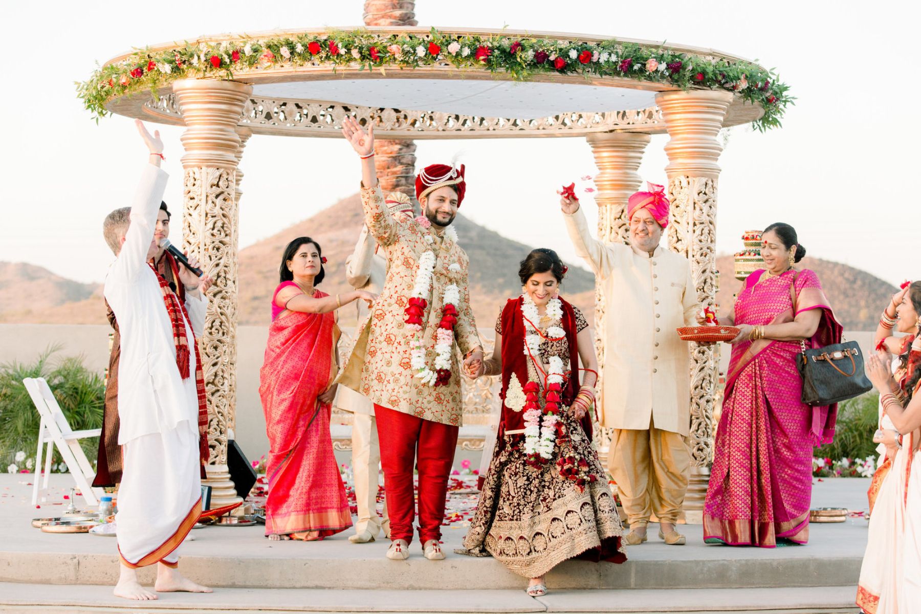 Wedding party celebrating at altar