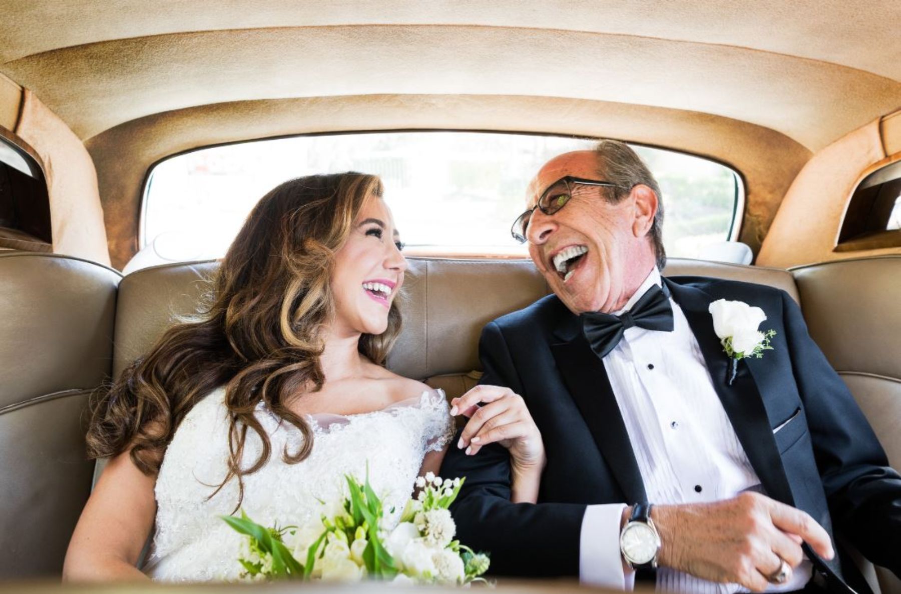 Father and daughter in car