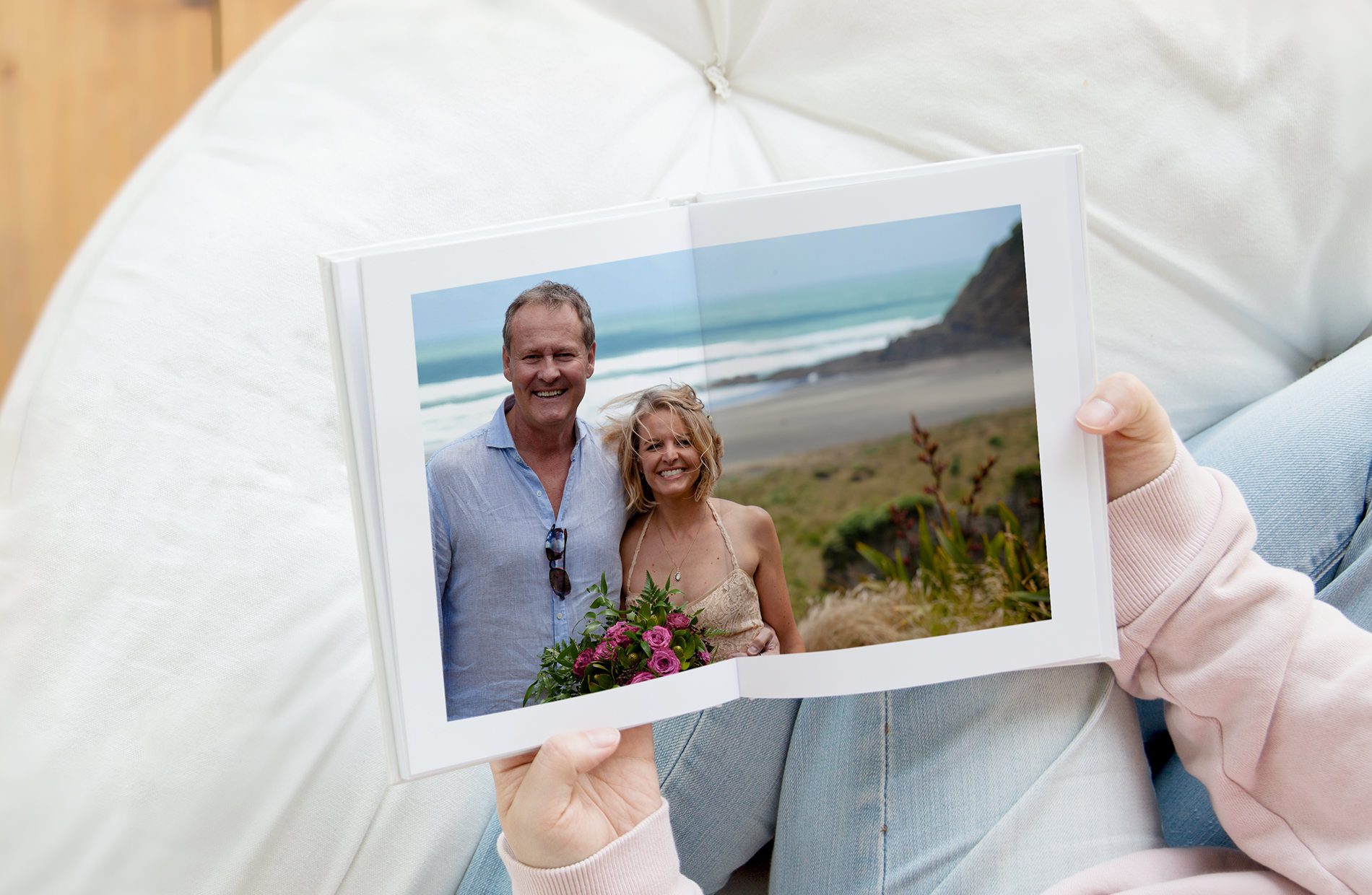 People at the beach on photo book.