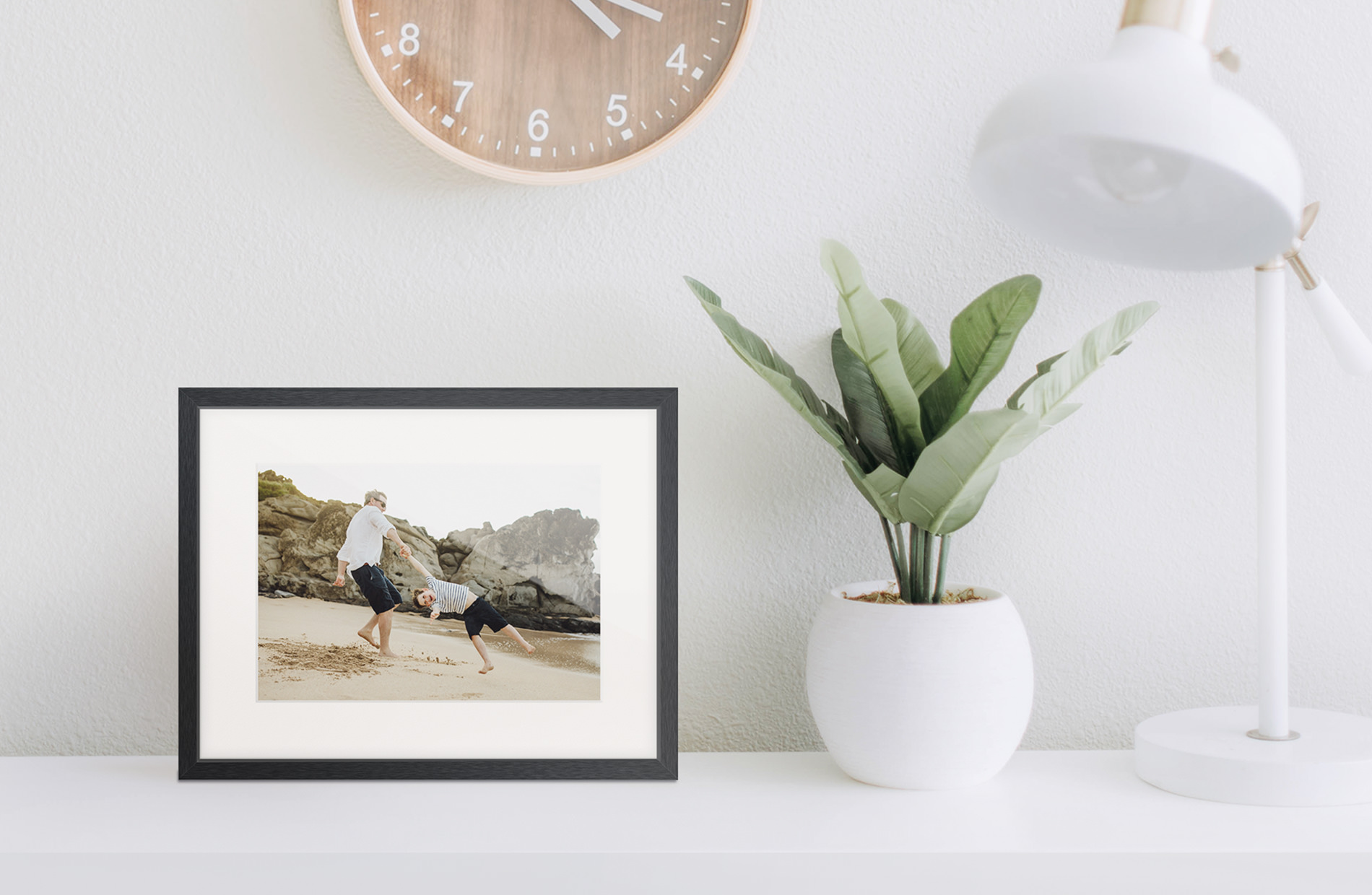 Gallery frame on side table.