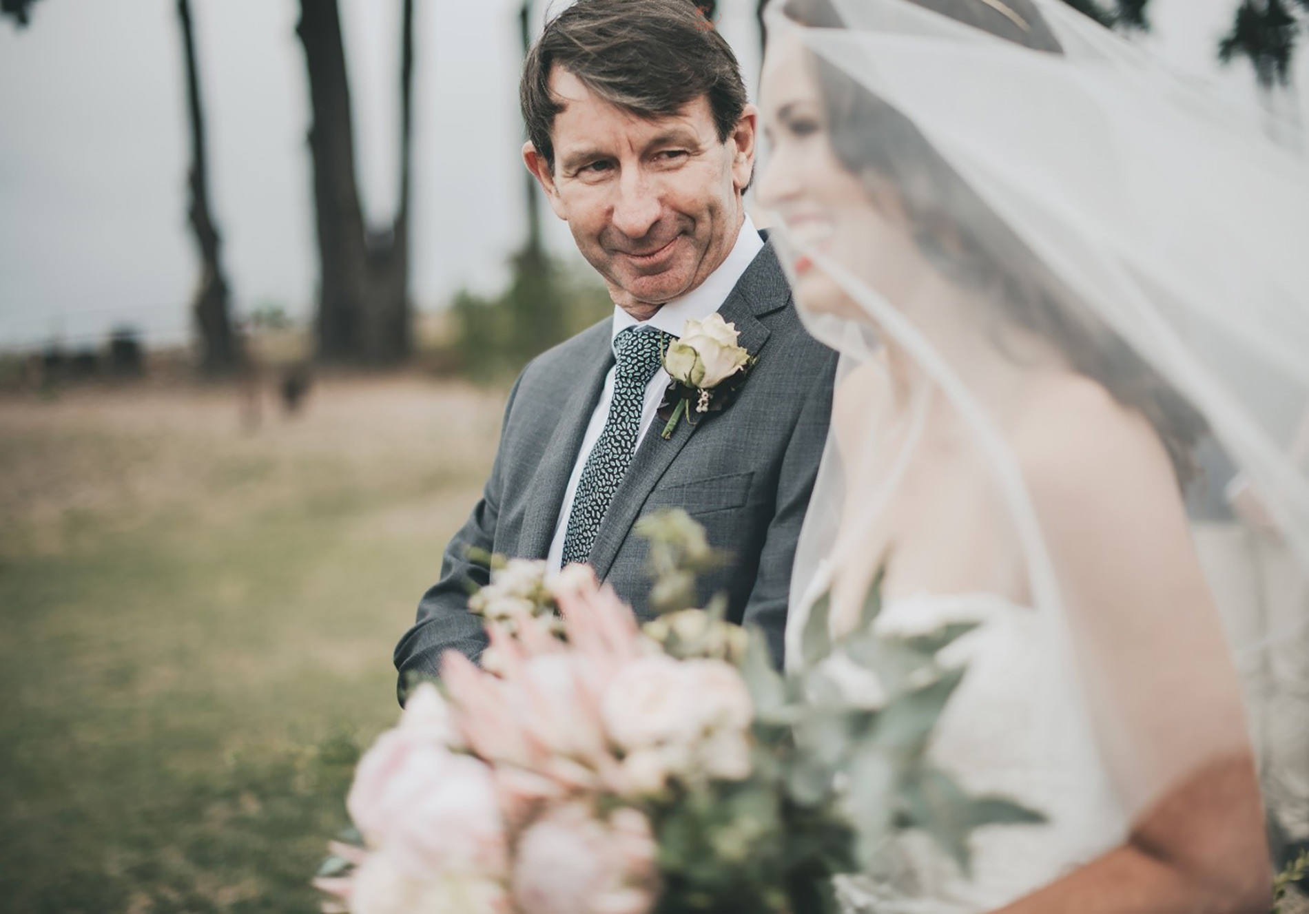 Father walking daughter down the aisle
