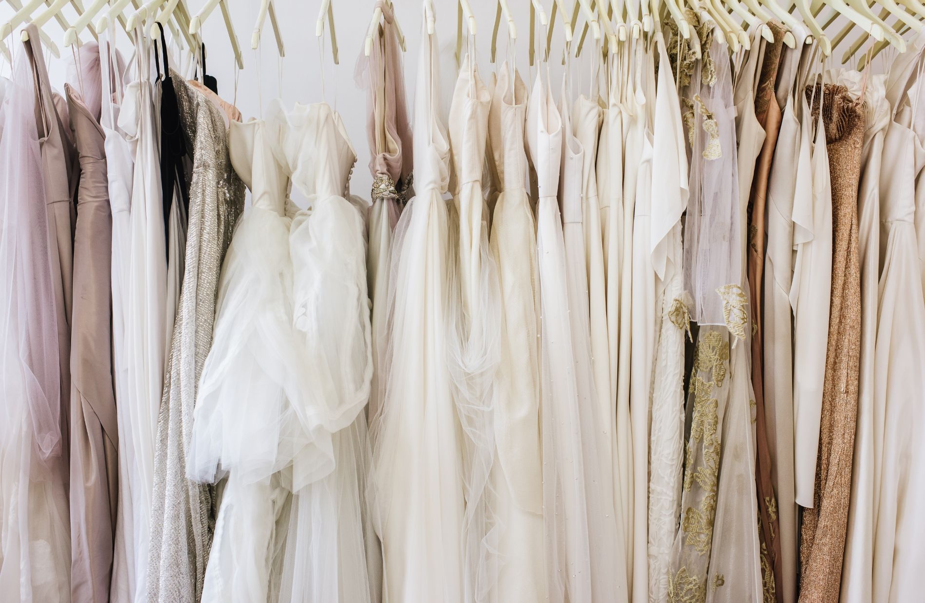 Rack of various wedding dresses