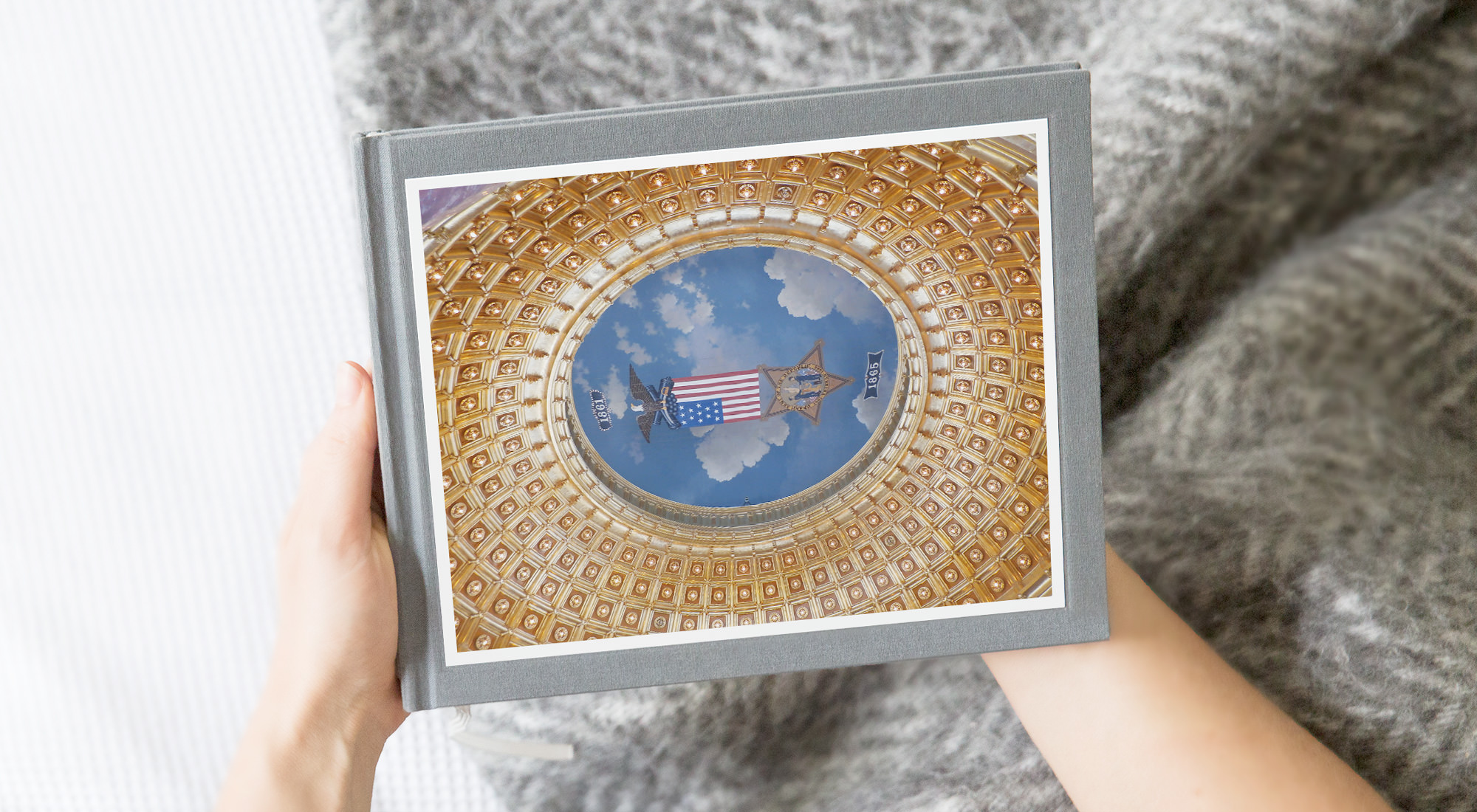 Photo book with cover image of an intricate ceiling design.