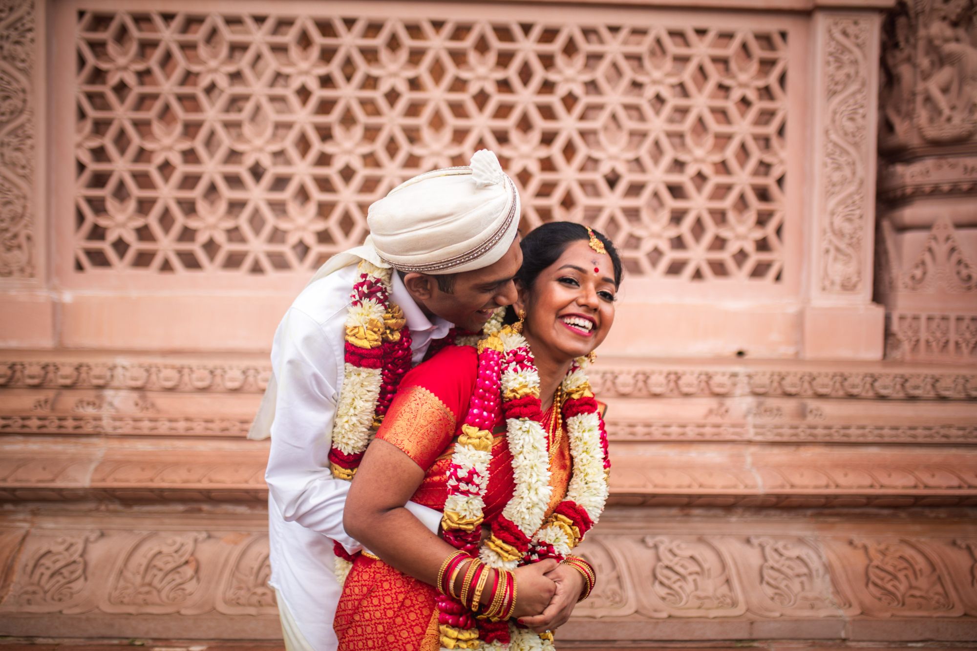 Newlywed couple in traditional dress.