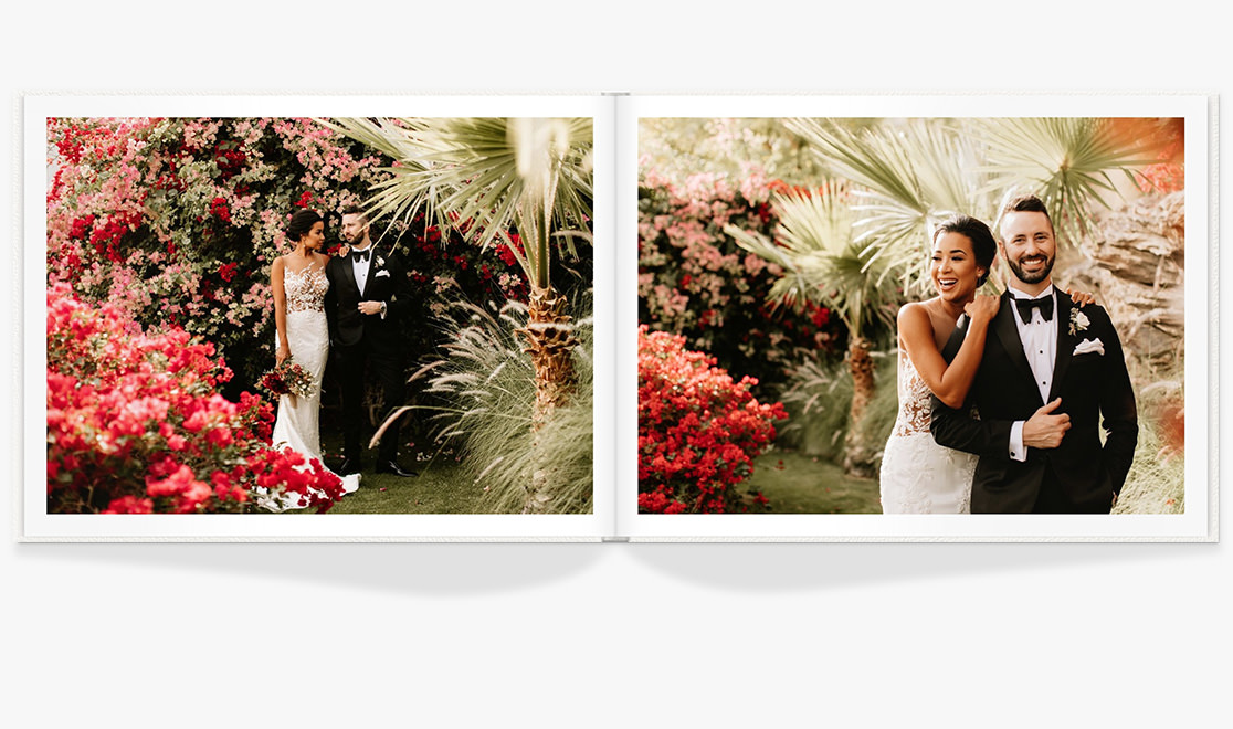 Open Wedding Photo Album showing spread of newlywed portraits