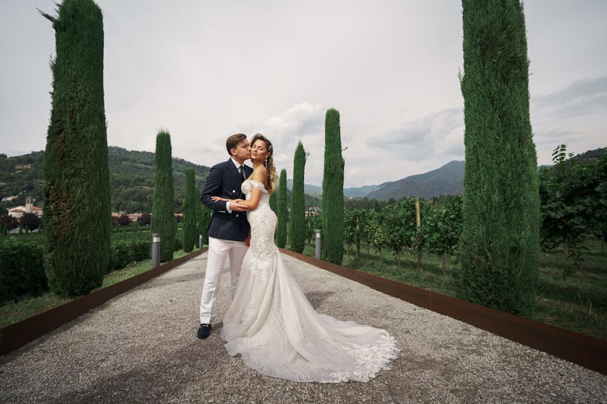 Bride and groom with countryside background