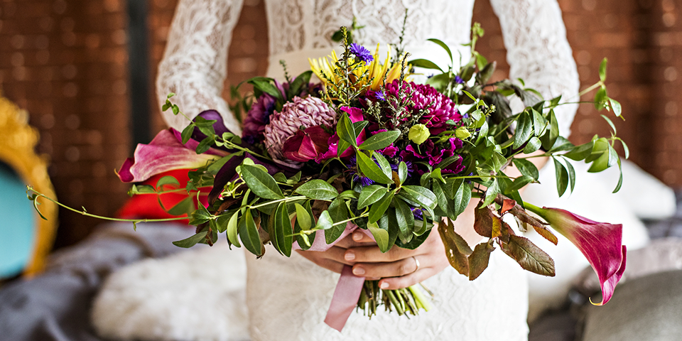 A bride holding a bouquet of flowers