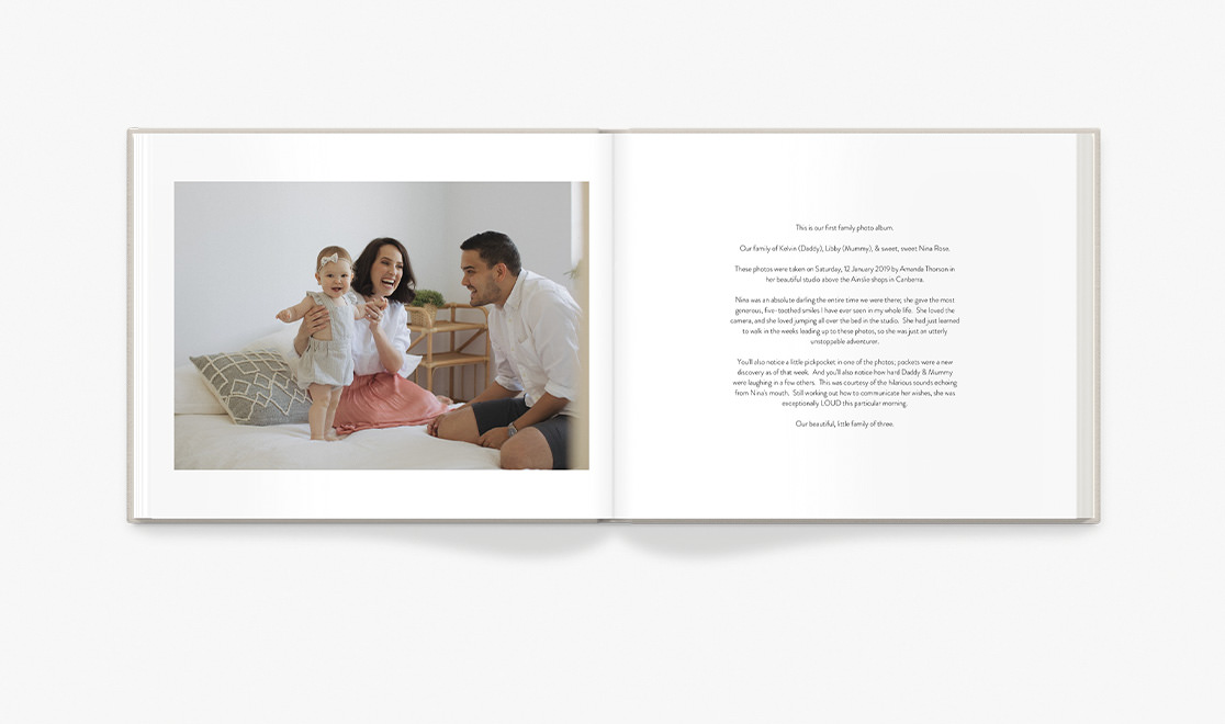 Open photo book showing family photo
